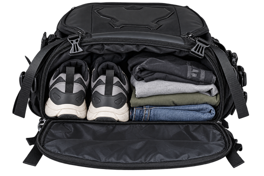 Stealth One opened and packed with shoes and clothes